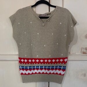 Elegant Beige Sweater with Red and Blue Pattern